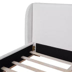 Letto moderno imbottito in bouclé in legno di gomma con testiera ad ali